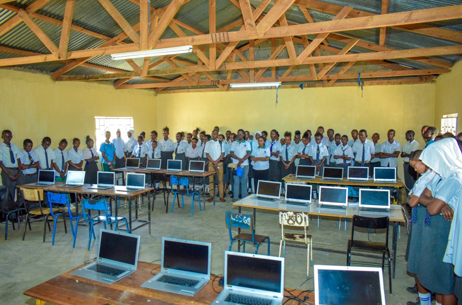 Students learning with laptops